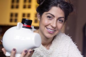 woman holding piggy bank